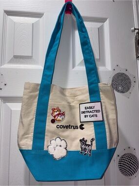 Covetrus Canvas Tote Bag with Teal Trim - 'Easily Distracted by Cats'